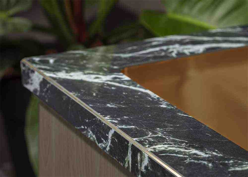 Joca metal strip incorporated into the edge finish